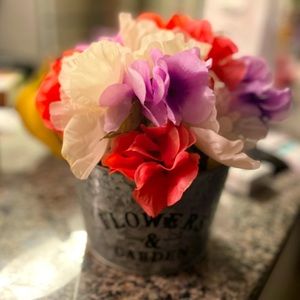 floral display in metal flower&garden bucket